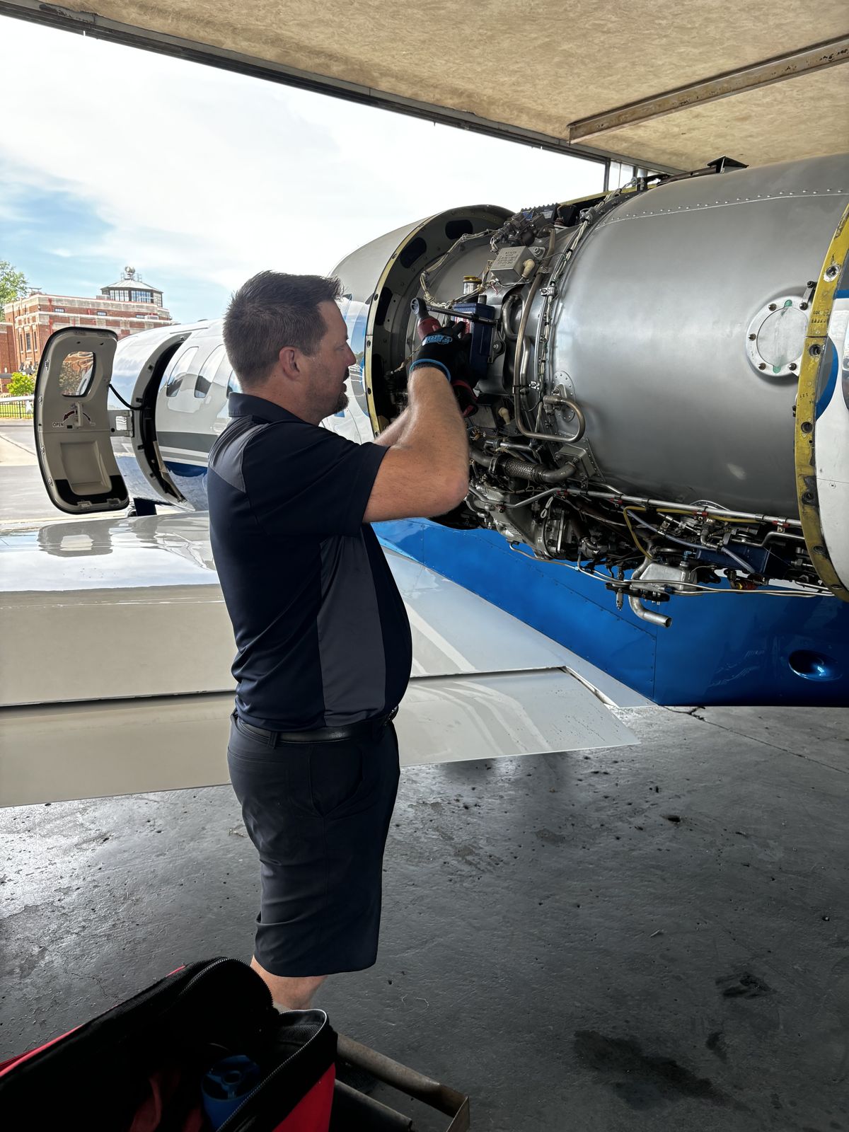 Working on the engine of a Cessna Citation V