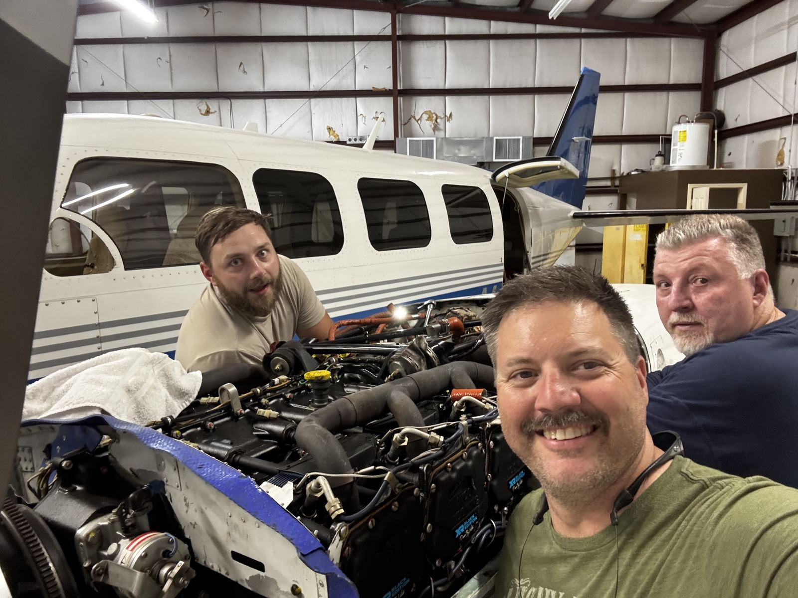 The Lift Enterprises team performing engine maintenance in the hangar
