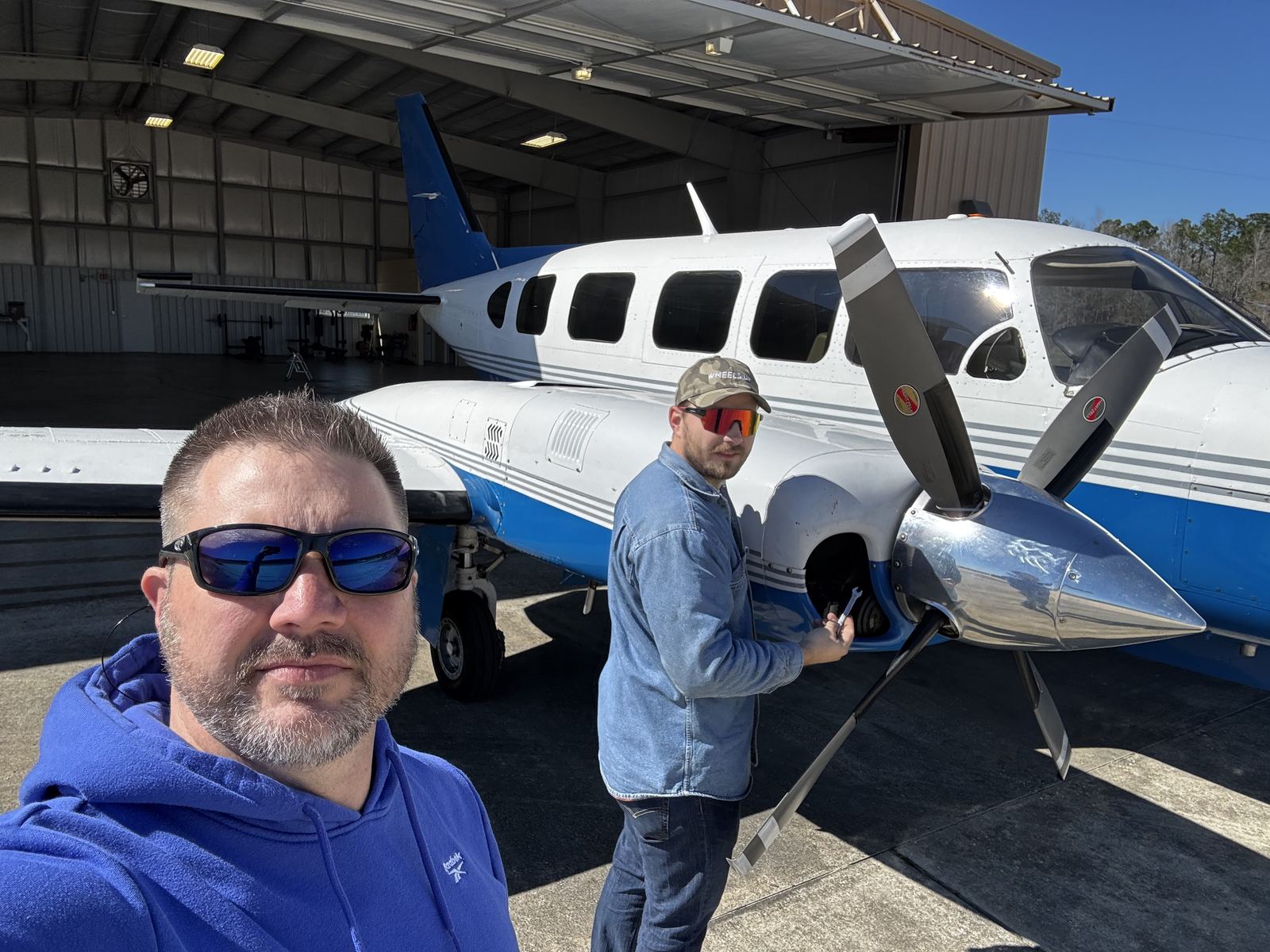 Lift Enterprises team servicing a Piper Navajo at the hangar